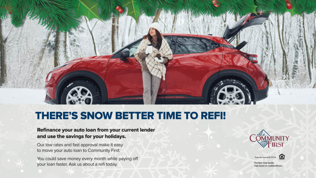 Woman outside red car in the snow